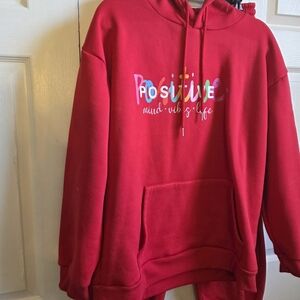 Red "Positive" Graphic Hoodie with matching jogger pants.